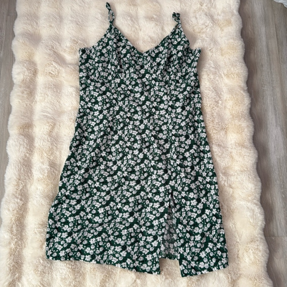 Green dress with white flowers. Sundress